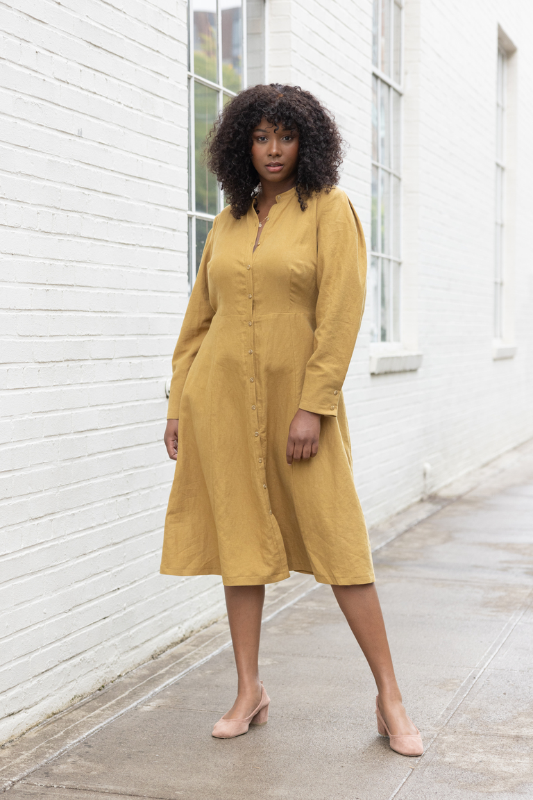 A photo of a finished Brom Pleated Sleeve Shirt Dress.