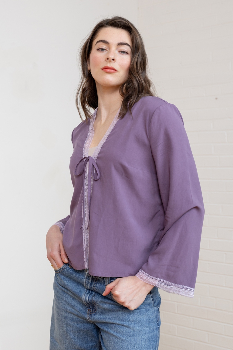 A photo of a finished Orchid Tie Front Bed Jacket.
